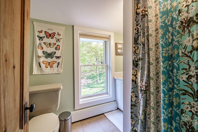 71 Brook Rd, Falmouth, ME 04105 - full bath with a baseboard heating unit, tile patterned floors, toilet, and a shower with shower curtain