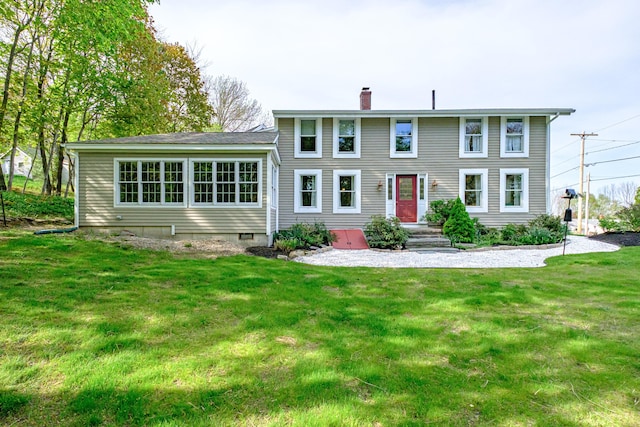 71 Brook Rd, Falmouth, ME 04105 - view of front facade featuring a chimney and a front lawn