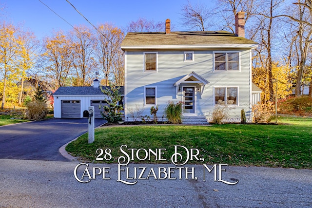 28 Stone Dr, Cape Elizabeth, ME 04107 - view of front of property featuring a front yard, a chimney, a garage, and driveway