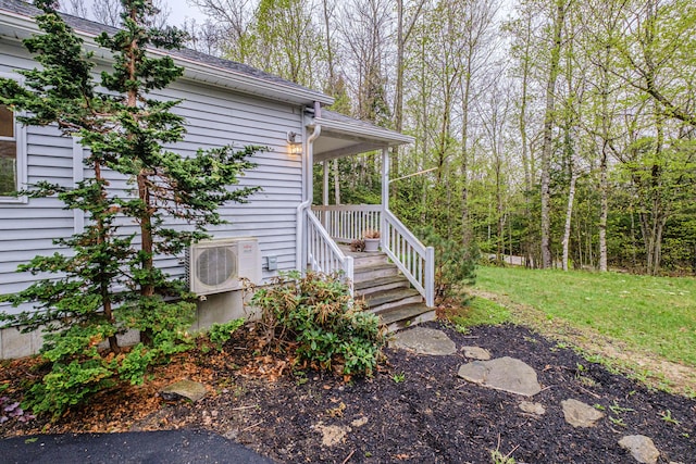 55 Reservoir Rd, Paris, ME 04281 - view of property exterior with ac unit and a lawn