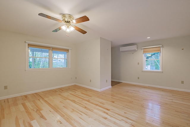 55 Reservoir Rd, Paris, ME 04281 - spare room featuring a wall mounted AC, healthy amount of natural light, light wood finished floors, baseboards, and recessed lighting