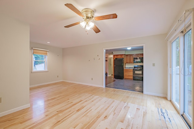 55 Reservoir Rd, Paris, ME 04281 - empty room featuring light wood-style floors, baseboards, and ceiling fan