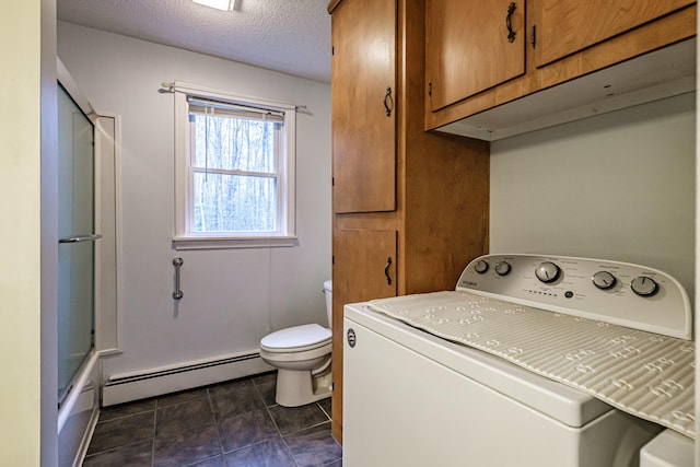 55 Reservoir Rd, Paris, ME 04281 - washroom with washer / clothes dryer, a baseboard heating unit, dark tile patterned flooring, and a textured ceiling
