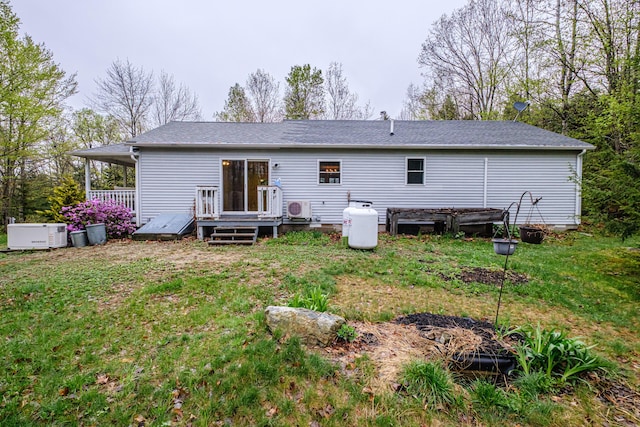 55 Reservoir Rd, Paris, ME 04281 - back of house with a yard, a deck, and a shingled roof