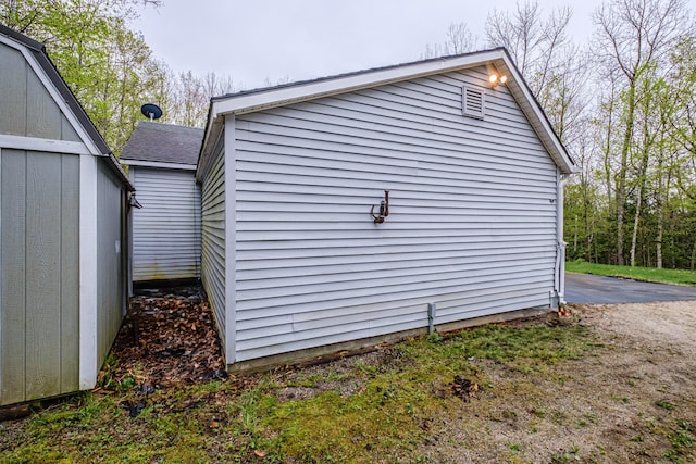 55 Reservoir Rd, Paris, ME 04281 - view of side of property with a shingled roof