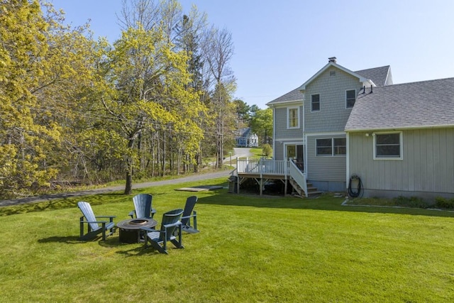 14 Williams St, Boothbay Harbor, ME 04538 - view of green lawn featuring a fire pit, a deck, and stairs