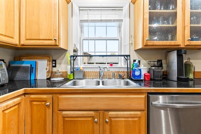 333 N St Unit 5, Saco, ME 04072 - kitchen with stainless steel dishwasher, a sink, tile countertops, glass insert cabinets, and brown cabinetry