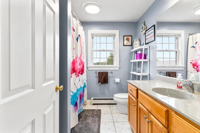 333 N St Unit 5, Saco, ME 04072 - full bathroom featuring a baseboard heating unit, healthy amount of natural light, vanity, and toilet