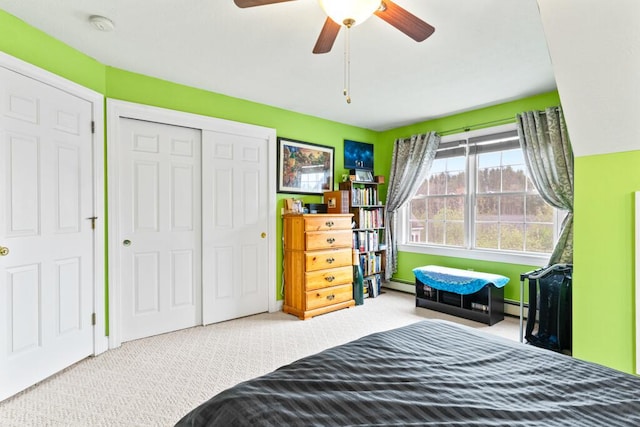 333 N St Unit 5, Saco, ME 04072 - carpeted bedroom featuring a baseboard radiator, a closet, baseboard heating, and ceiling fan