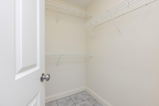5 Honeysuckle Ln, Scarborough, ME 04074 - spacious closet with light tile patterned floors