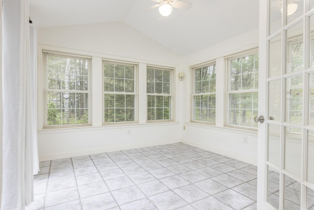 5 Honeysuckle Ln, Scarborough, ME 04074 - unfurnished sunroom with vaulted ceiling, baseboards, and tile patterned floors
