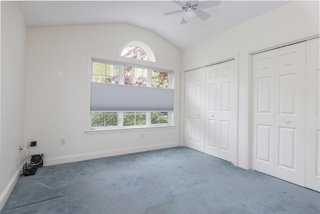 5 Honeysuckle Ln, Scarborough, ME 04074 - unfurnished bedroom with carpet floors, two closets, vaulted ceiling, baseboards, and ceiling fan