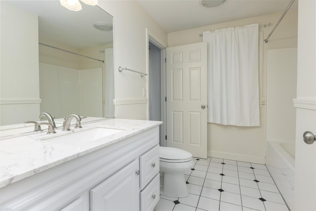 5 Honeysuckle Ln, Scarborough, ME 04074 - bathroom with tile patterned floors, vanity, bathing tub / shower combination, toilet, and baseboards