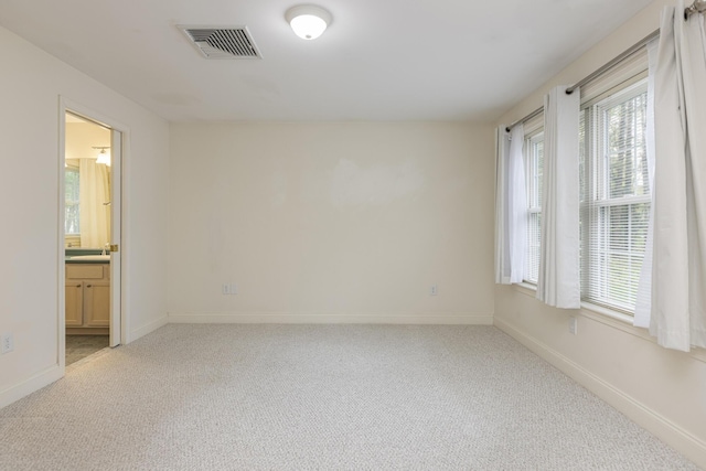 5 Honeysuckle Ln, Scarborough, ME 04074 - spare room featuring light carpet and baseboards