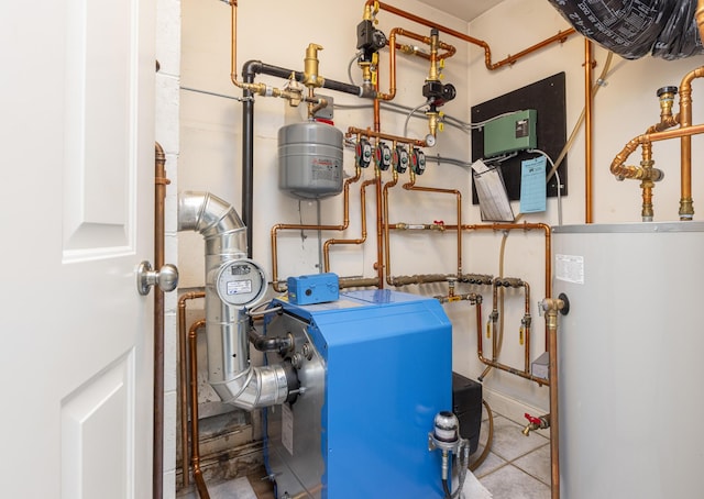 5 Honeysuckle Ln, Scarborough, ME 04074 - utility room featuring gas water heater and a heating unit