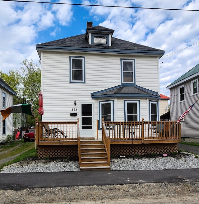 295 Grove St, Bangor, ME 04401 - rear view of house featuring a wooden deck, roof with shingles, and a chimney