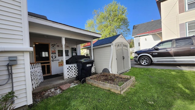 295 Grove St, Bangor, ME 04401 - view of grassy yard with a shed and an outdoor structure