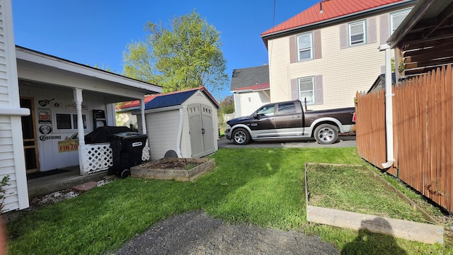 295 Grove St, Bangor, ME 04401 - view of yard featuring a storage unit and an outbuilding