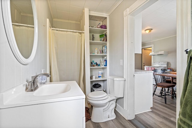 192 Wilson St, Brewer, ME 04412 - full bathroom with crown molding, wood finished floors, toilet, vanity, and curtained shower