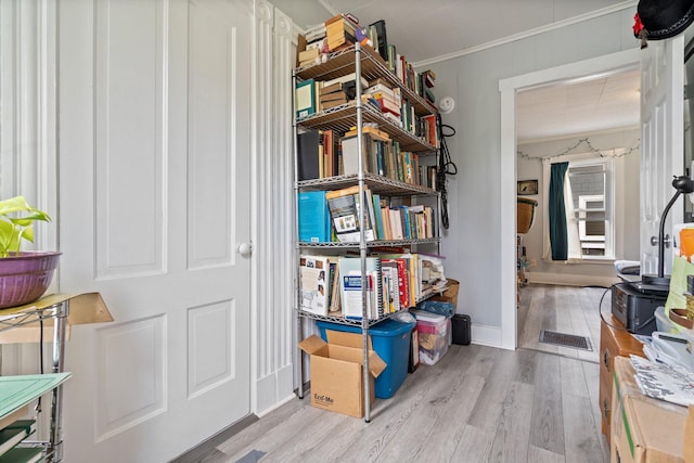 192 Wilson St, Brewer, ME 04412 - hallway featuring crown molding, wood finished floors, and baseboards