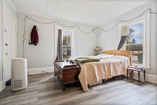 192 Wilson St, Brewer, ME 04412 - bedroom featuring ornamental molding, wood finished floors, and baseboards