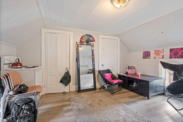 192 Wilson St, Brewer, ME 04412 - additional living space with vaulted ceiling, wood finished floors, and washer / dryer