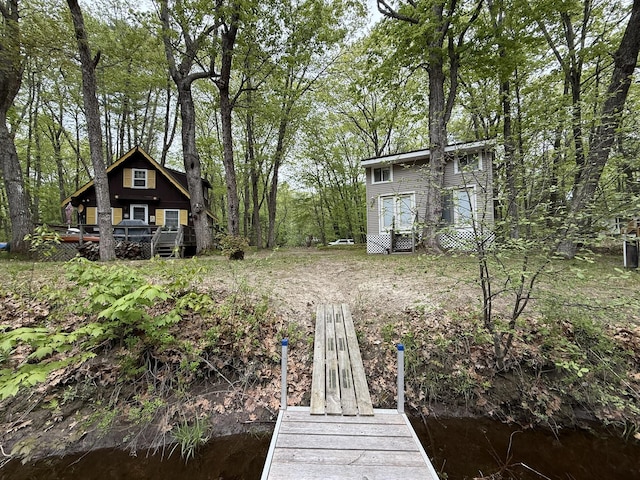 26-28 Acorn Rd, Naples, ME 04055 - view of yard with a dock