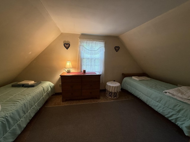 26-28 Acorn Rd, Naples, ME 04055 - carpeted bedroom with lofted ceiling