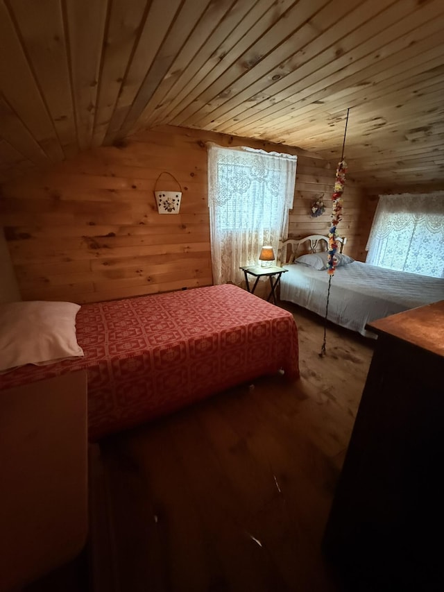 26-28 Acorn Rd, Naples, ME 04055 - bedroom with wooden walls and wooden ceiling