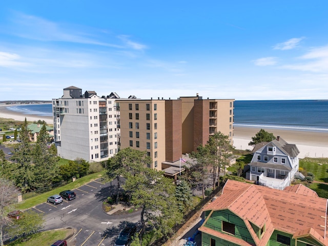 205 E Grand Ave Unit 7E, Old Orchard Beach, ME 04064 - view of property featuring view of water and beach and uncovered parking