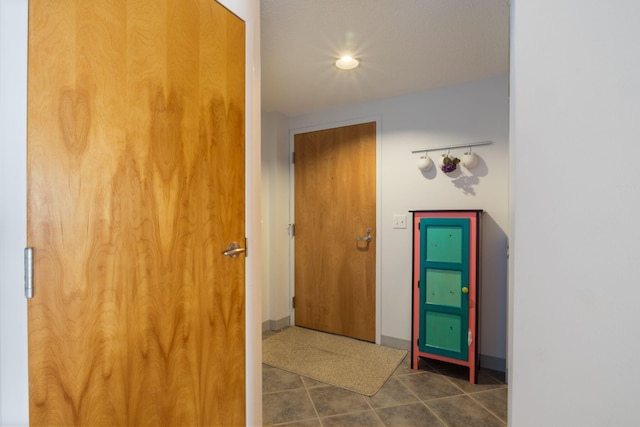 205 E Grand Ave Unit 7E, Old Orchard Beach, ME 04064 - hall featuring tile patterned floors, baseboards, and recessed lighting