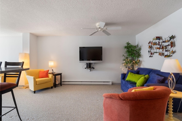 205 E Grand Ave Unit 7E, Old Orchard Beach, ME 04064 - carpeted living area with a baseboard heating unit, ceiling fan, and a textured ceiling