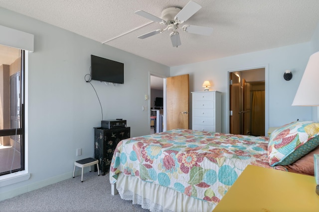 205 E Grand Ave Unit 7E, Old Orchard Beach, ME 04064 - carpeted bedroom with a textured ceiling and ceiling fan