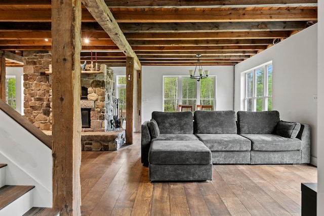 6 Bluebird Way, Kennebunk, ME 04043 - living room featuring wood-type flooring, stairway, and plenty of natural light