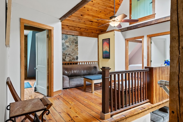 6 Bluebird Way, Kennebunk, ME 04043 - hall with vaulted ceiling, wood-type flooring, wooden ceiling, and baseboards