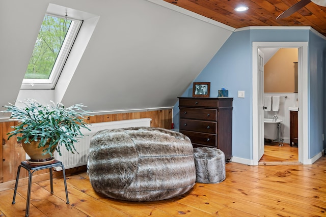 6 Bluebird Way, Kennebunk, ME 04043 - living area with lofted ceiling, light wood finished floors, and wooden ceiling
