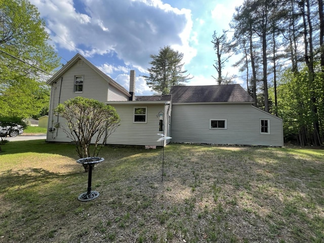 41 Winter St, Lisbon, ME 04250 - view of home's exterior featuring a yard