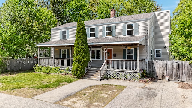 23 Paul St, South Berwick, ME 03908 - view of front of house with a chimney, covered porch, and a shingled roof