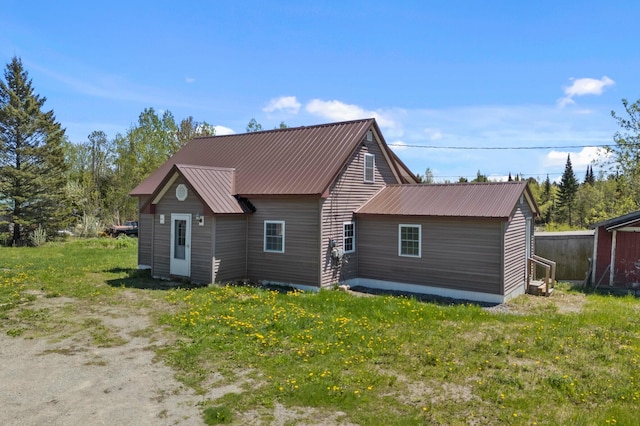 back of property with metal roof