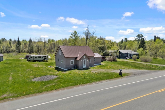 view from above of property featuring a heavily wooded area