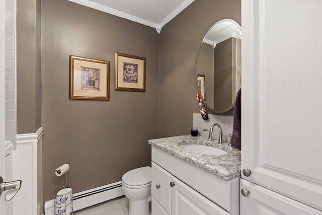 bathroom with a baseboard heating unit, crown molding, toilet, vanity, and tile patterned flooring