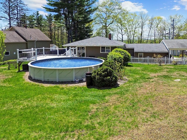 swimming pool featuring a wooden deck