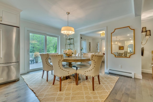 4 Brown Hill Ln, Scarborough, ME 04074 - dining area with a baseboard radiator, crown molding, hardwood / wood-style flooring, and baseboards