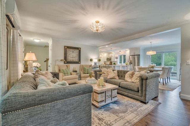 4 Brown Hill Ln, Scarborough, ME 04074 - living area with a wall mounted air conditioner, ornamental molding, a chandelier, dark wood-style flooring, and baseboards