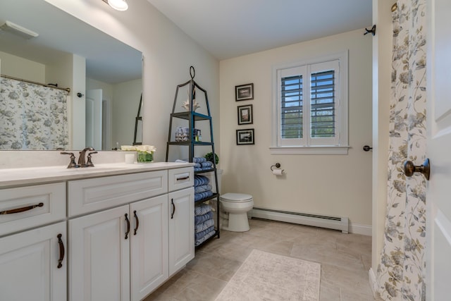 4 Brown Hill Ln, Scarborough, ME 04074 - bathroom with a baseboard heating unit, toilet, and vanity