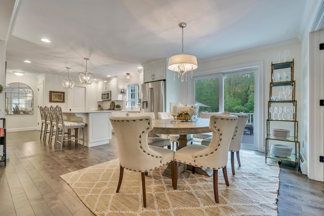 4 Brown Hill Ln, Scarborough, ME 04074 - dining area featuring a chandelier, crown molding, recessed lighting, wood finished floors, and baseboards