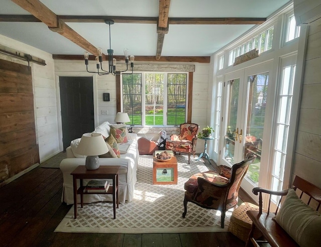 131 N St, Bath, ME 04530 - sunroom with french doors, wood walls, beam ceiling, a chandelier, and plenty of natural light