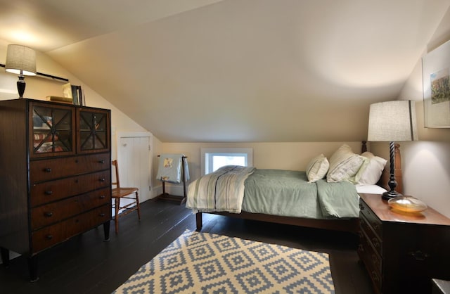 131 N St, Bath, ME 04530 - bedroom with lofted ceiling and dark wood-type flooring