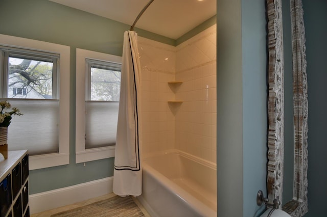 131 N St, Bath, ME 04530 - bathroom with vanity, shower / tub combo, and baseboards