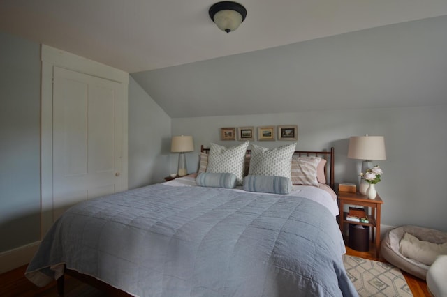 131 N St, Bath, ME 04530 - bedroom featuring wood finished floors and lofted ceiling